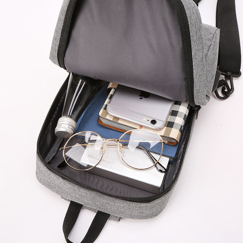 Leisure Travel Shoulder Bag in Black, showcasing its sleek design and compact size.