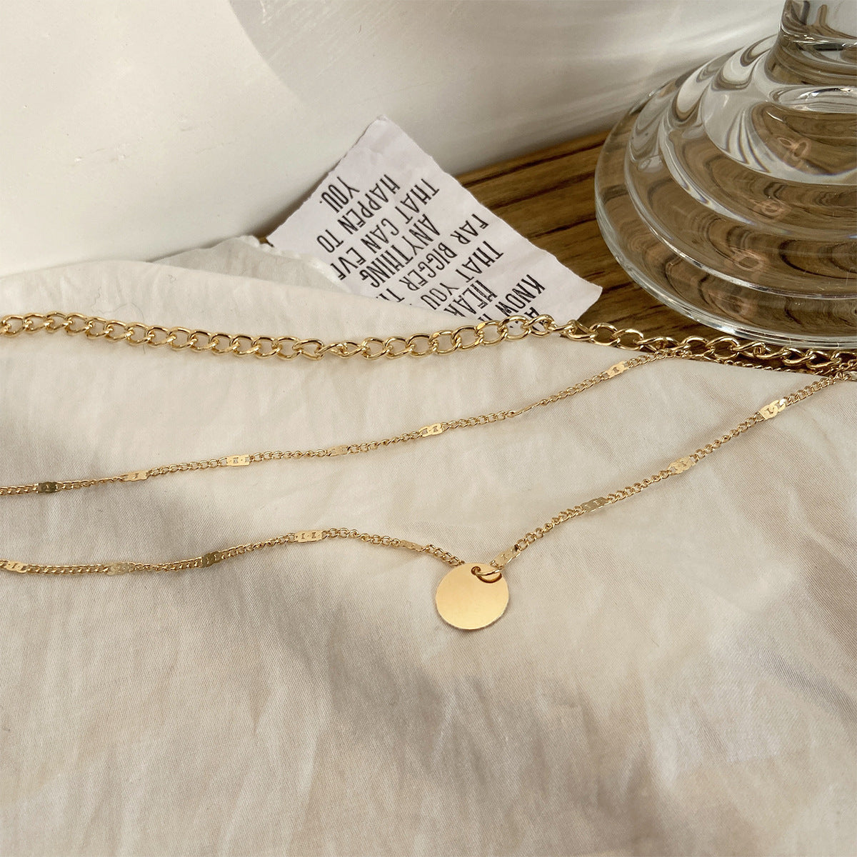 Stylish multilayer chain necklace with personality disc charms for daily wear.