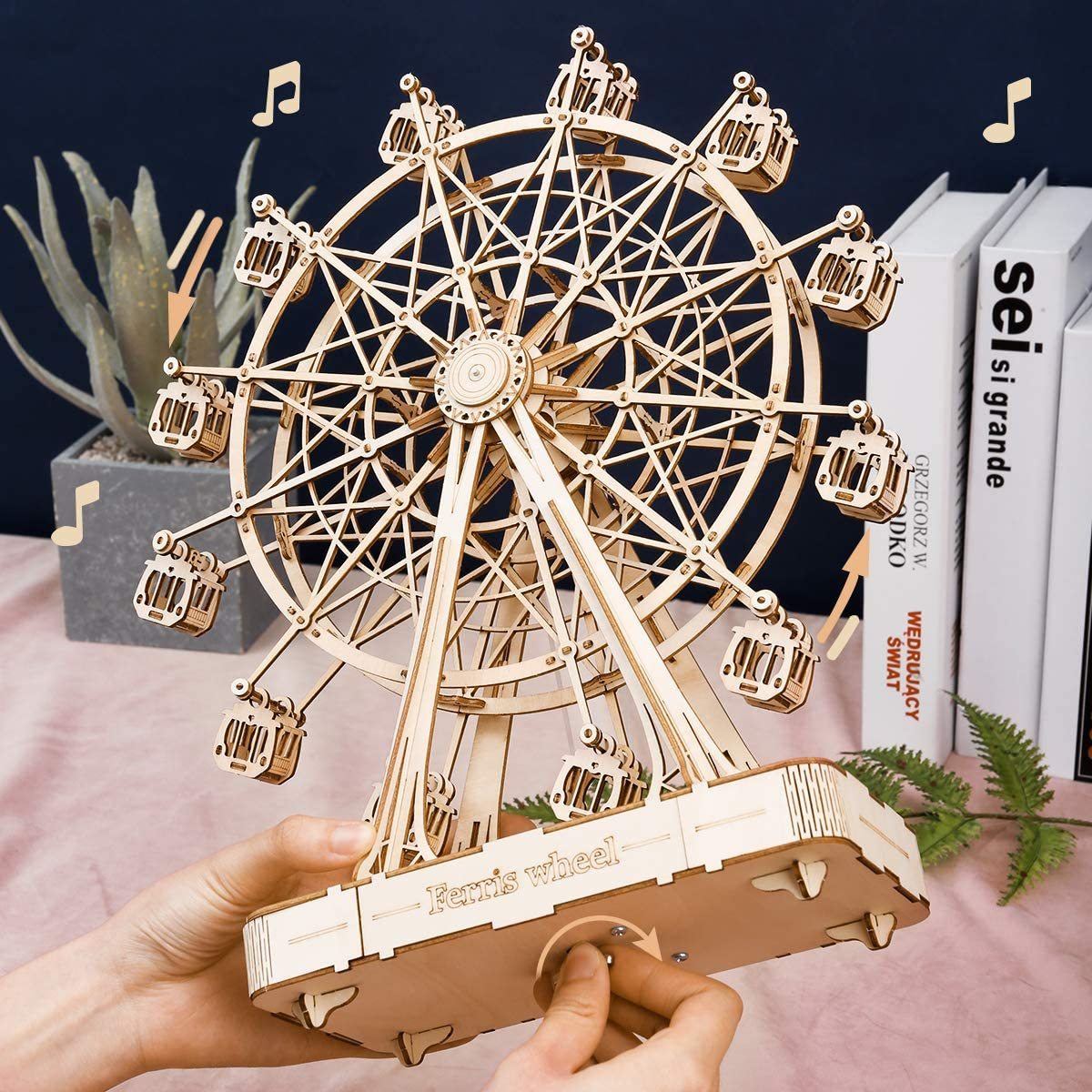 232-piece rotatable wooden Ferris wheel with musical tune.