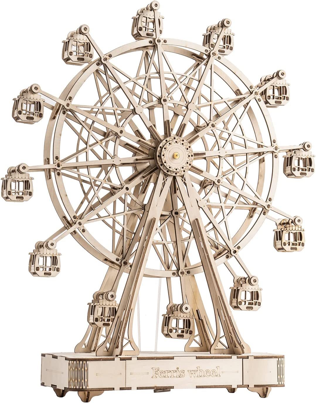 DIY wooden music box featuring Ferris wheel and winding mechanism.